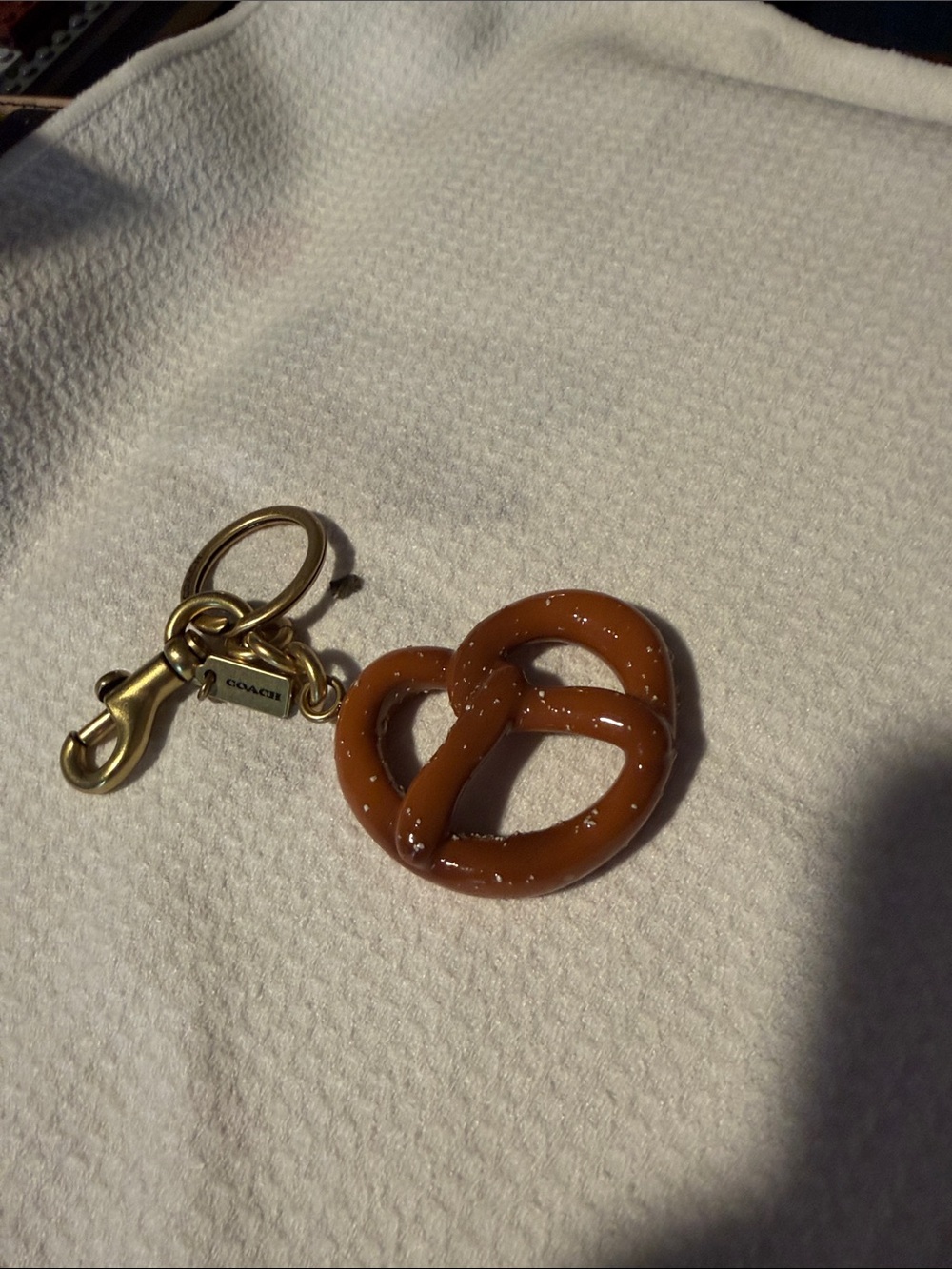 Coach Brown Pretzel Charm Keyring with Gold Hardware